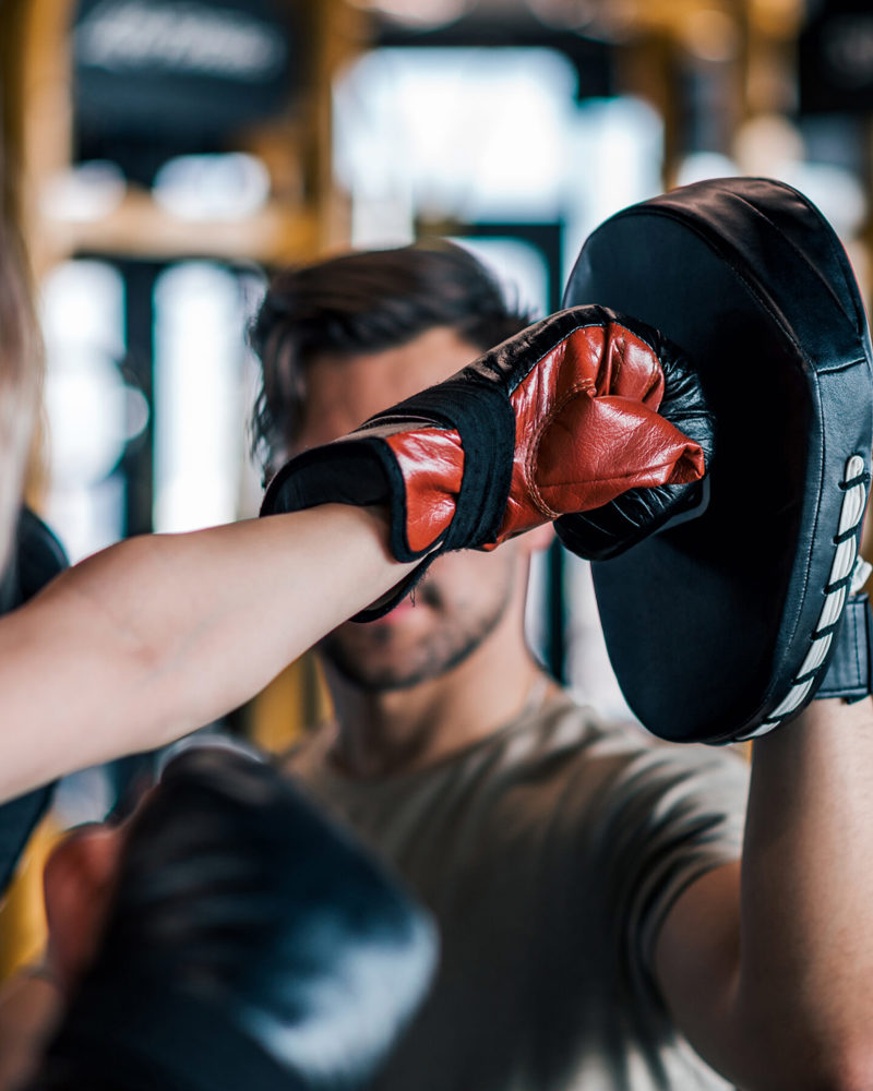 Woman Boxer Hitting Glove Her Sparring Partner Close Up 2880X1800